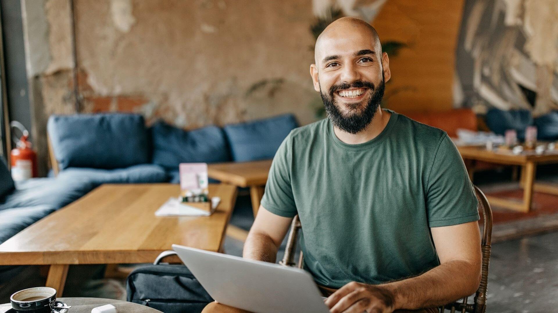 Male professional use statistical analytics tools from home.