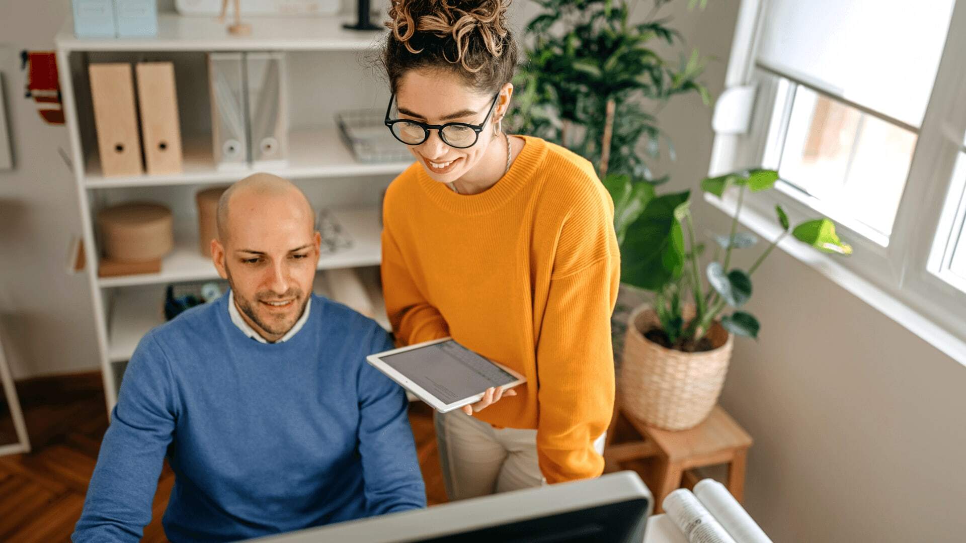 Developers using the Python programming language and other languages to create a machine learning system.