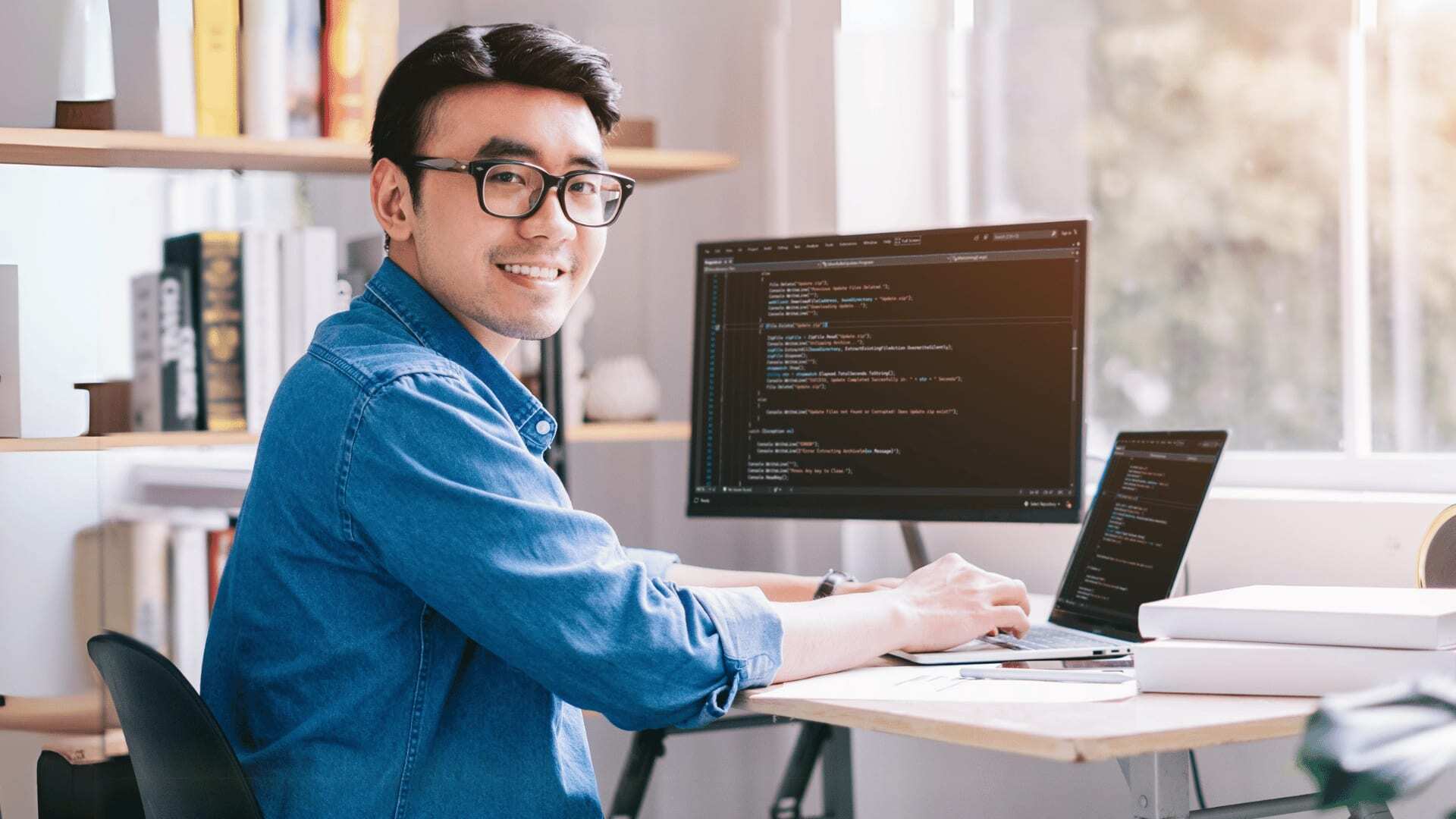 Data scientist using programming algorithms to review previously analysed data from analytics and business intelligence teams.