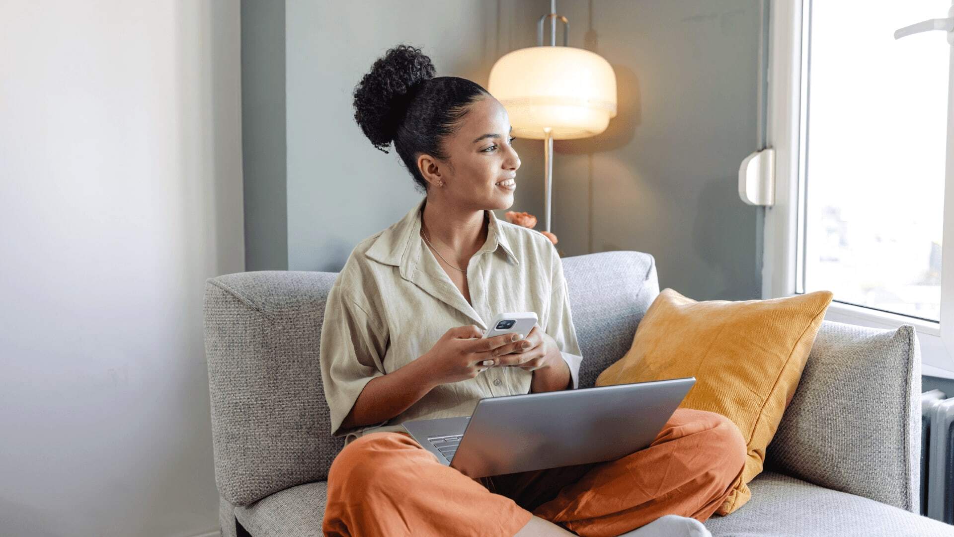 Woman speaking with managers on her phone.