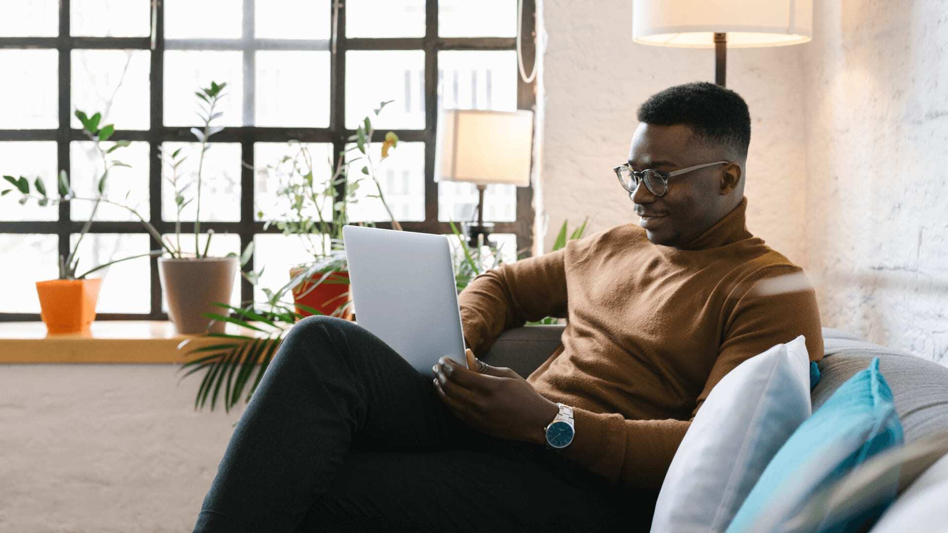 Man joining postgraduate students from home.