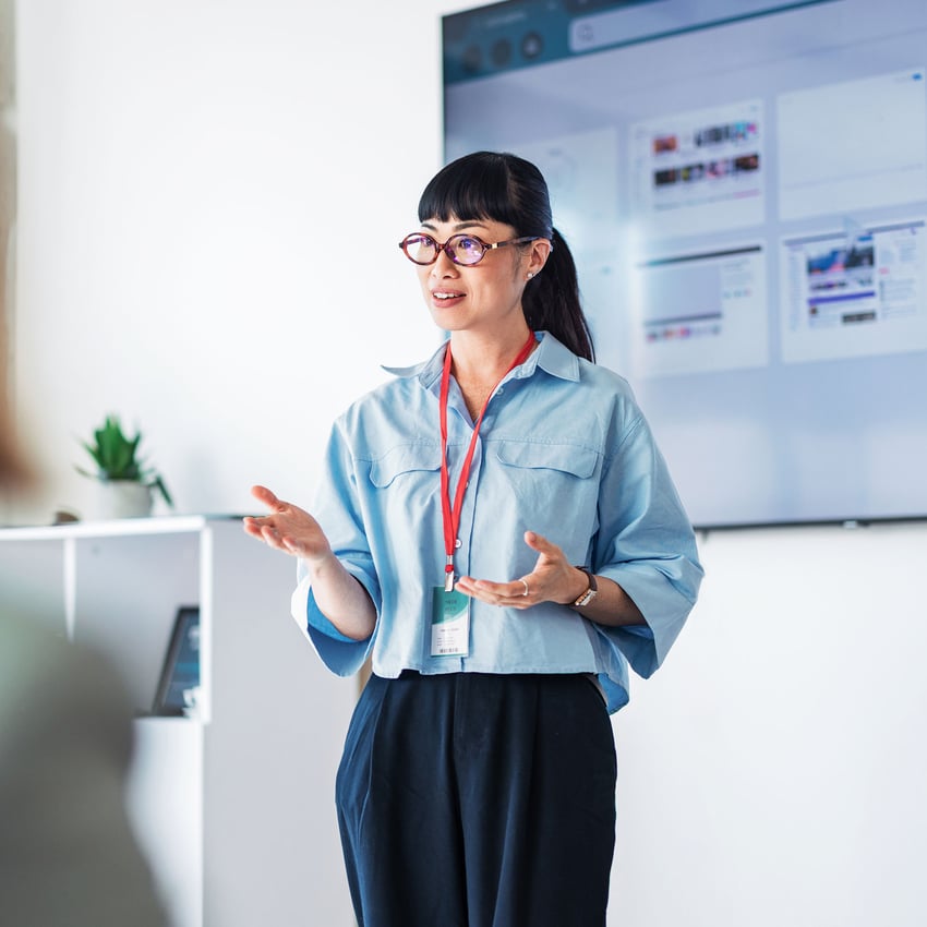 Woman giving a presentation in an office setting