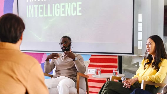 A business man presenting a session on artificial intelligence.