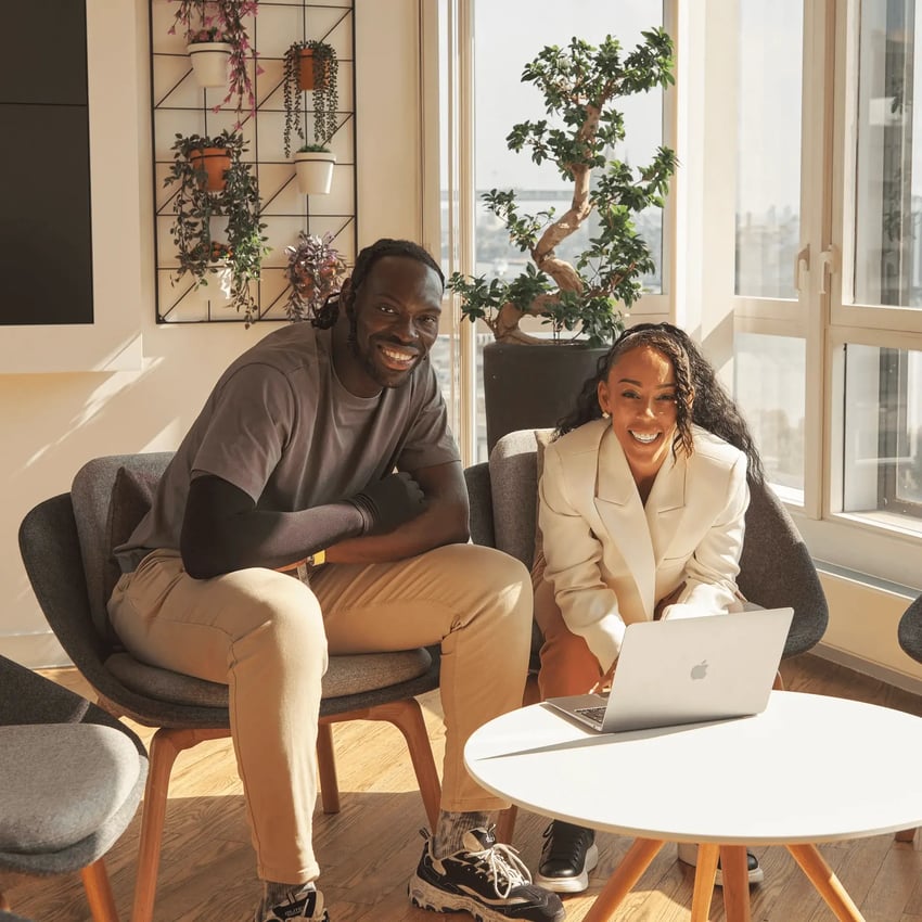 Smiling male and female distance learners exploring undergraduate, postgraduate and foundation year distance learning courses.