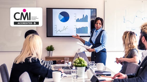 Woman in blue shirt present financial charts.