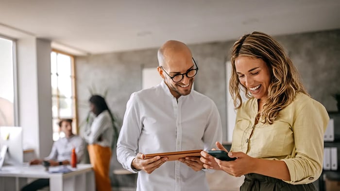 woman and man discussing results in office