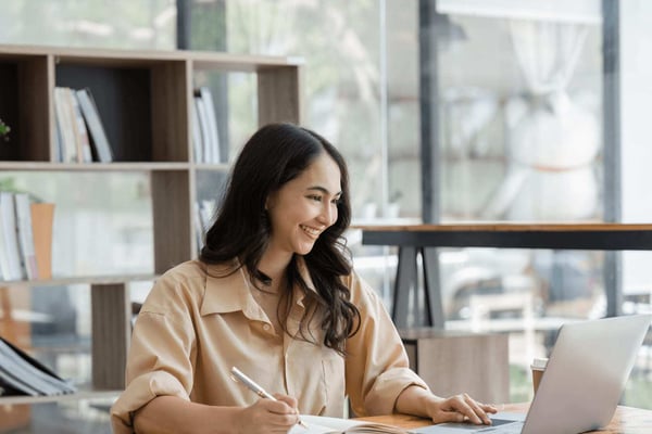 Woman starting a degree in January working in lunch break